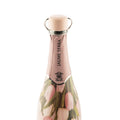 Brut Rose Stopper: tappo per Champagne, colore rosa, inserito all'interno di una bottiglia di champagne